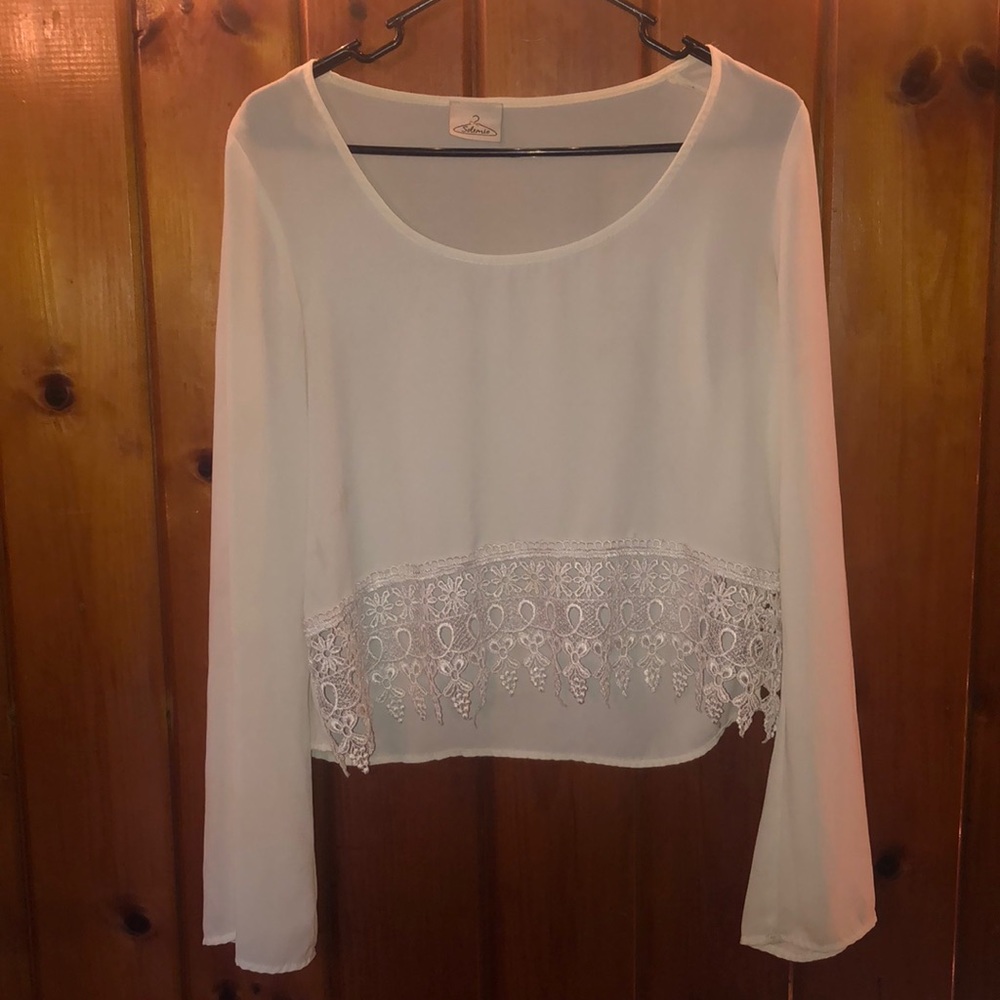 White long sleeve with lace at bottom